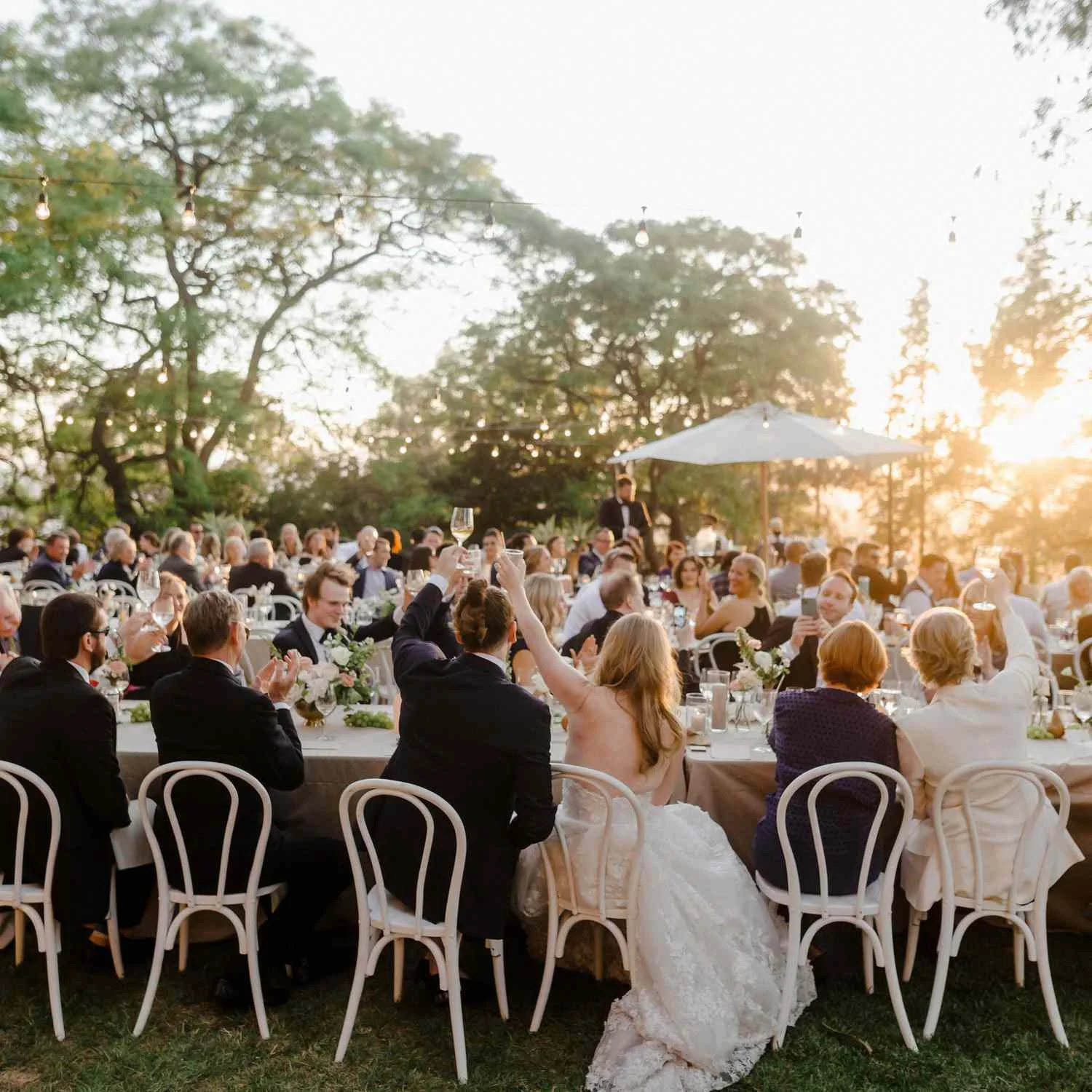 guests-at-reception-toasting-logal-cole-photography-recirc-.webp